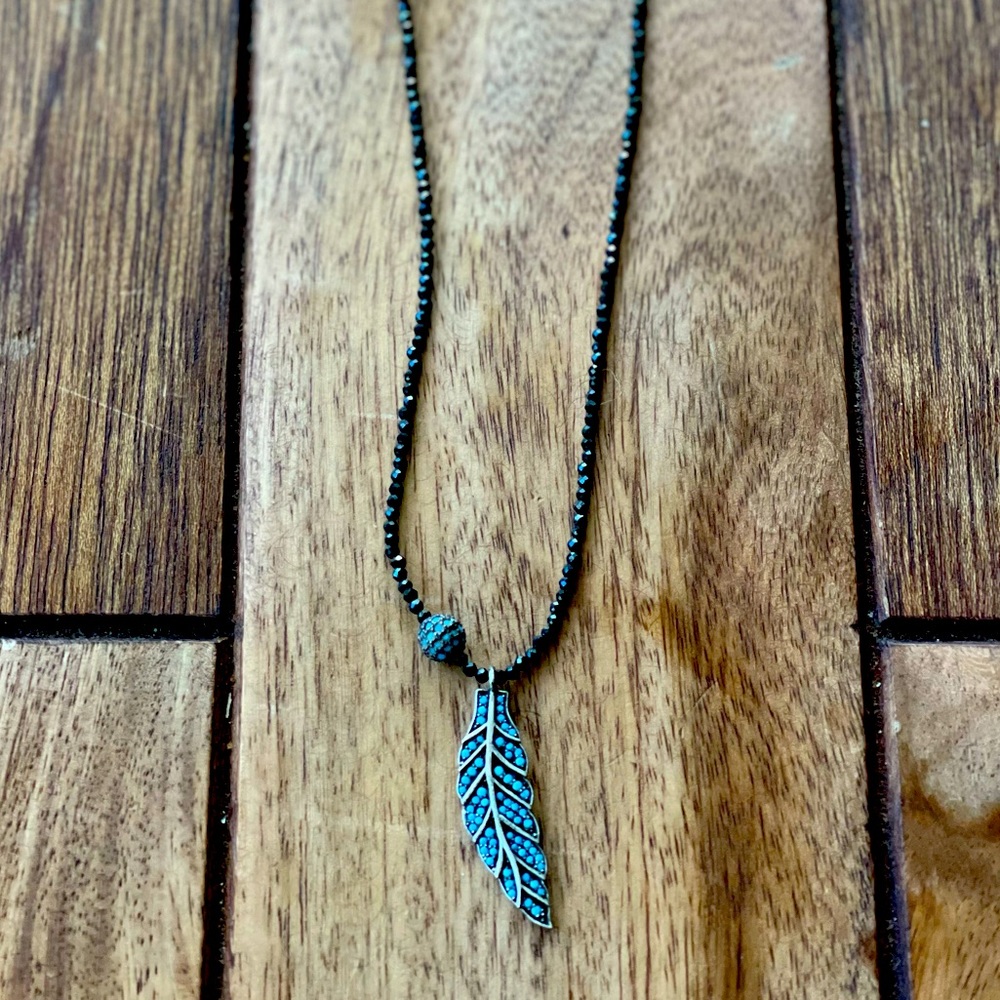 Stone necklace.